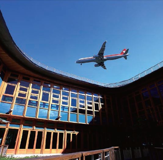 A flight operated by China-based Shanghai Airlines approaches
the runway at Taipei Songshan Airport, one of many regularly
scheduled cross-strait flights flown since 2009.